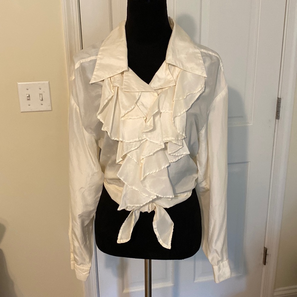 100% Silk blouse.